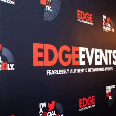 An EDGE Creative banner on display at an EDGE Creative event