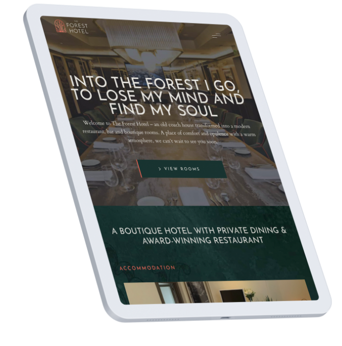 The Forest Hotel digital website homepage shown on tablet