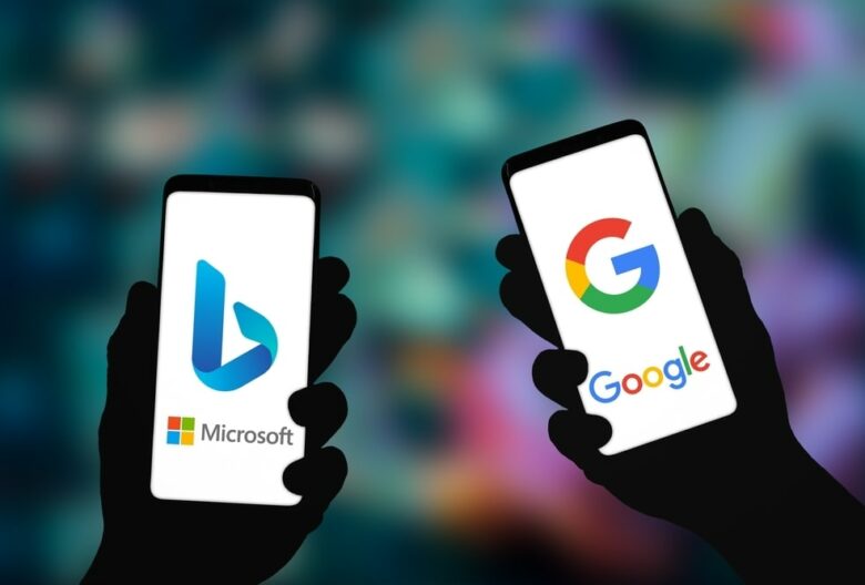 Phones being held showing Google and Bing logo