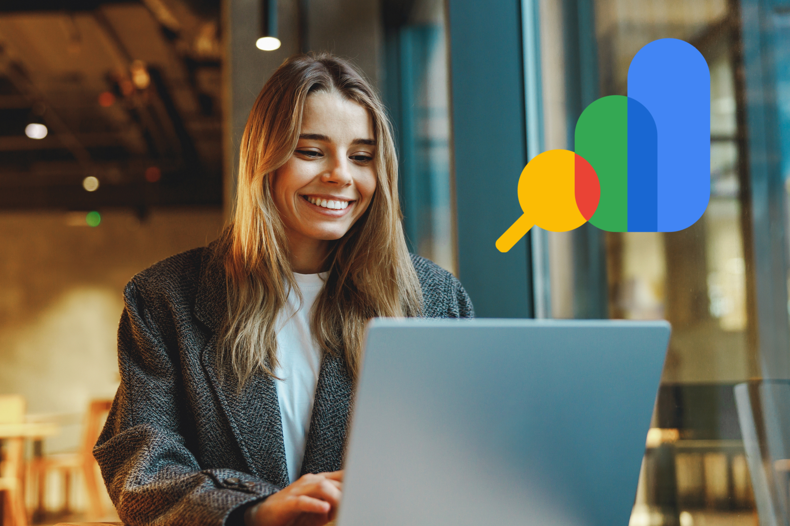 Woman smiling at laptop featuring Google Search Console Logo